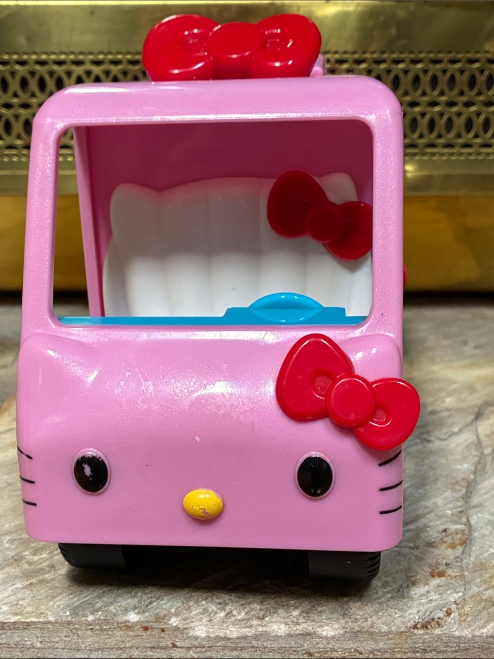Hello Kitty Pink Toy Car with Red Bows and Yellow Nose